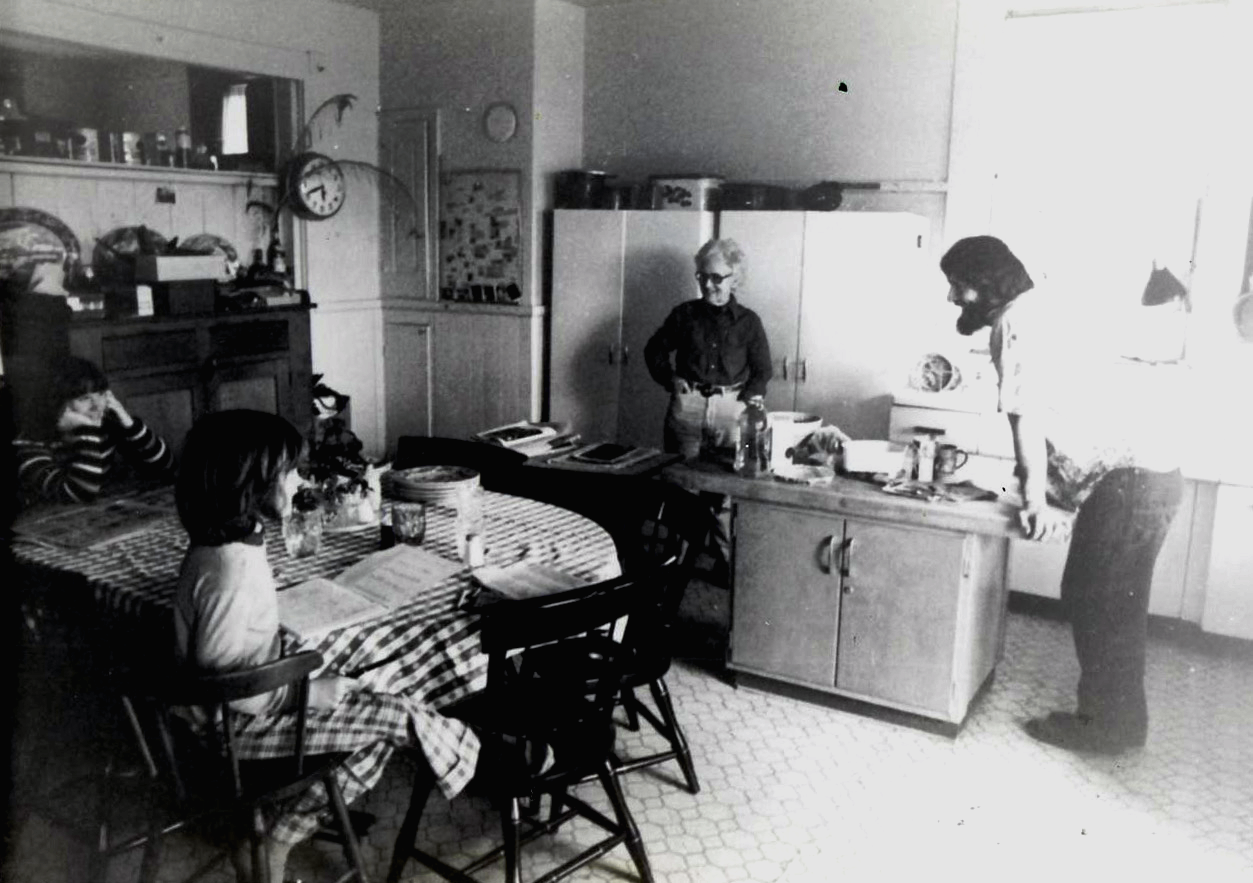 Picture of kitchen with family members
